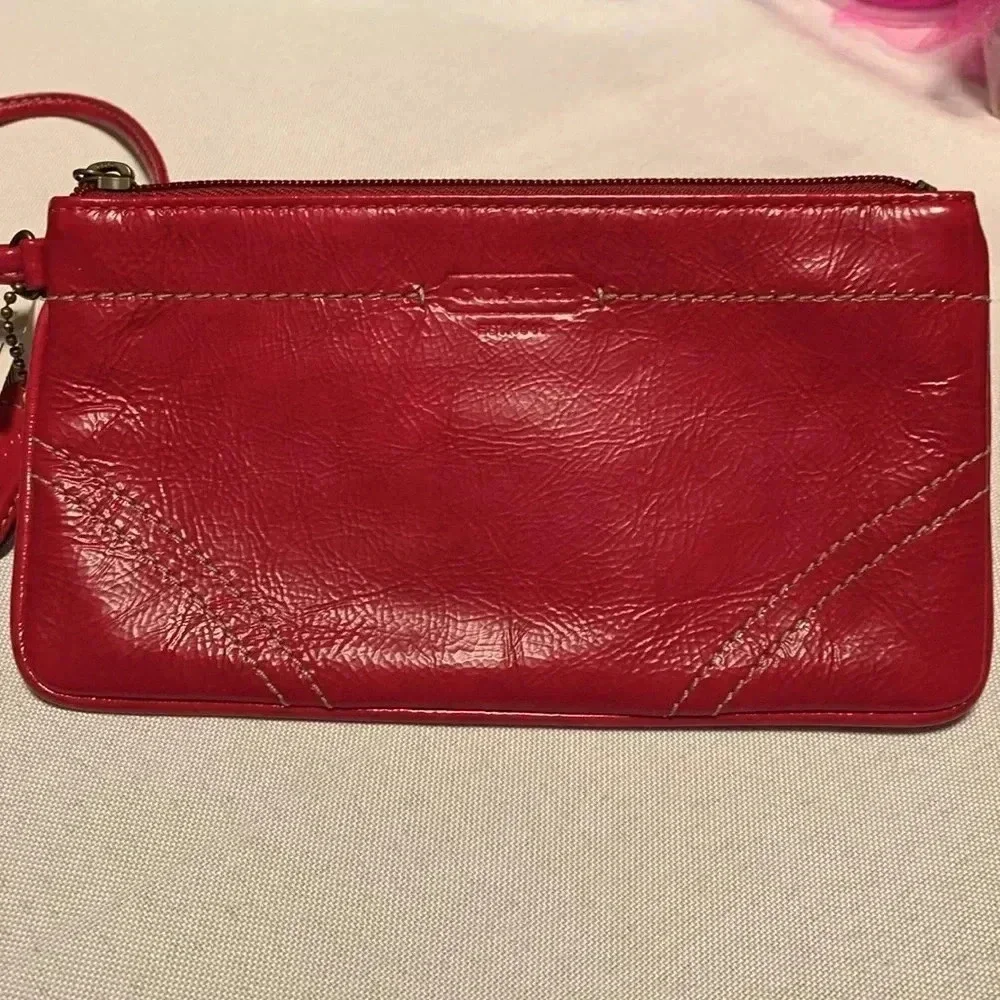 COACH Wristlet, patent leather. NWT.